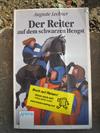 Der Reiter auf dem schwarzen Hengst