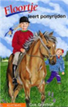 Floortje leert ponyrijden